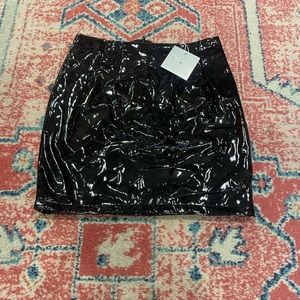 Latex/leather mini skirt from Amazon. Size small